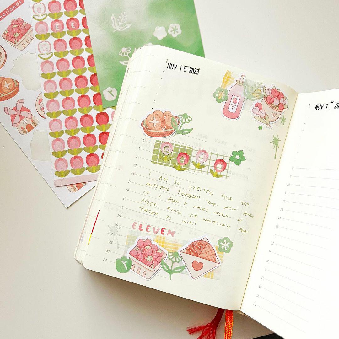 Journal spread decorated with stickers.