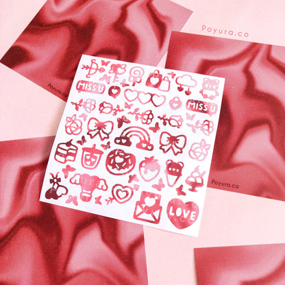 Borderless tiny sticker with Valentine love cutouts in red and pink tints