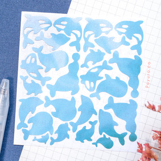 Borderless sticker with whale and dolphin cutouts in different blue tints