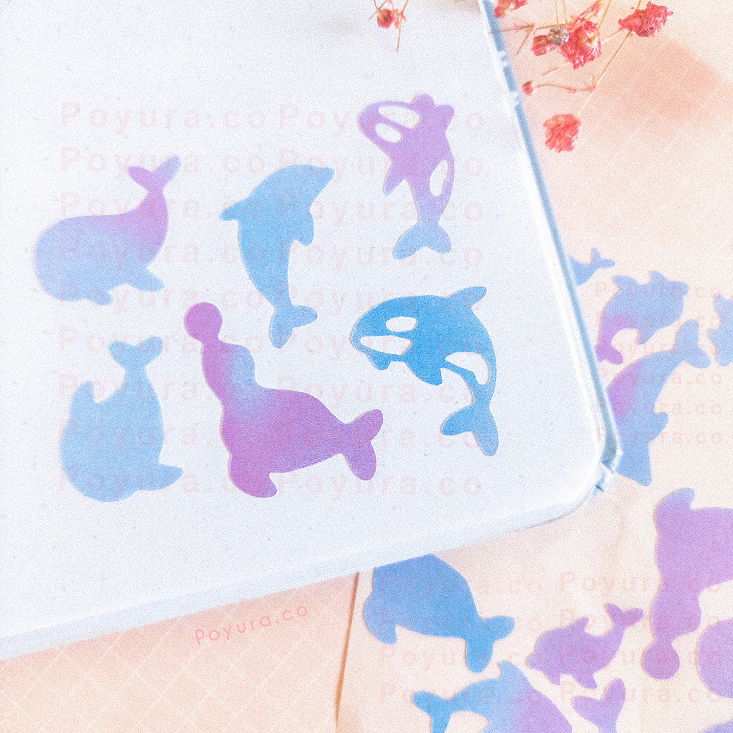 Borderless sticker with whale cutouts in different blue and purple tints