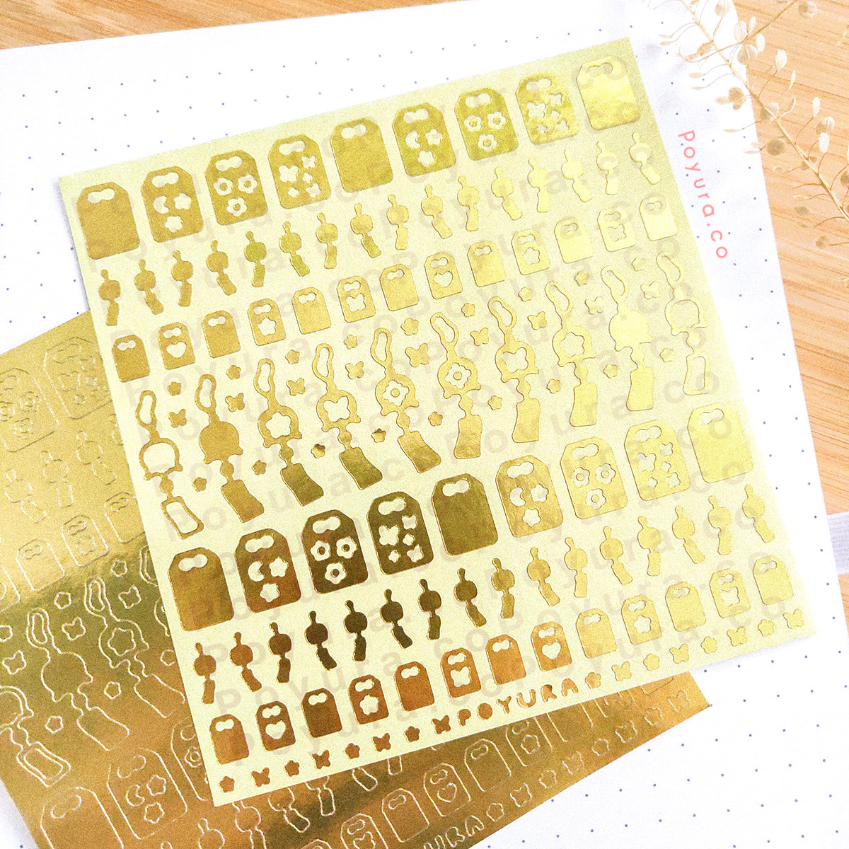 Borderless sticker with windchime and omamori cutouts in gold foil