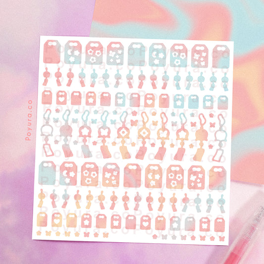 Borderless sticker with windchime and omamori cutouts in different blue, pink, and orange tints