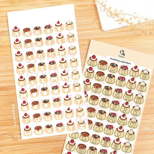 Sticker sheet of yellow puddings with alphabet letter cutout in the center.