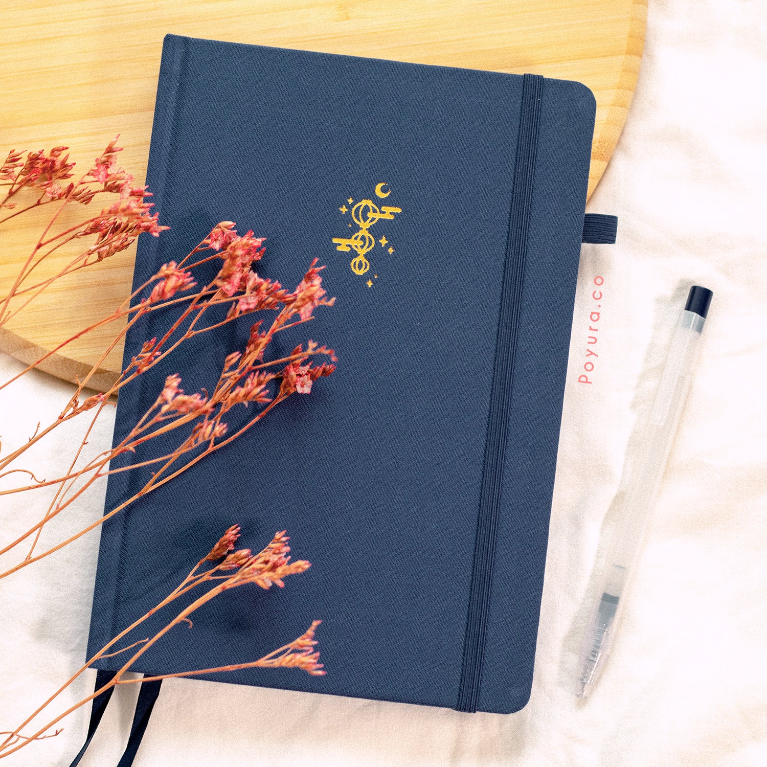 A look inside the Midnight Lantern A5 Bullet Journal with gold foil and dotted paper